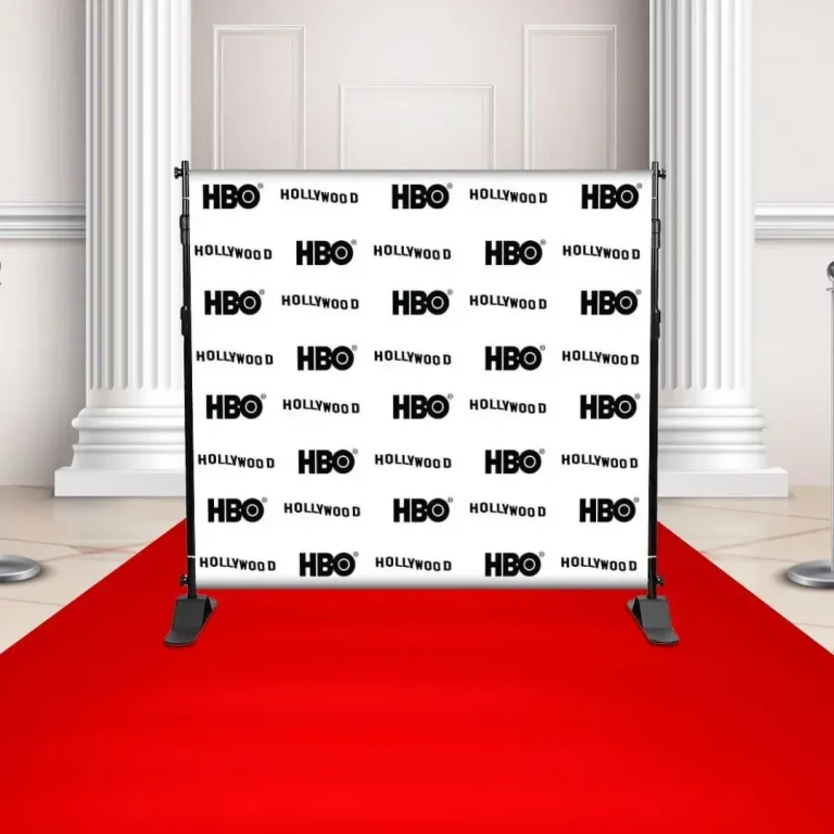 logo step and repeat backdrop on red carpet